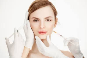 cosmetologists hands making medical botox injections beautiful blonde skin lifting facial treatment beauty spa 176420 9347